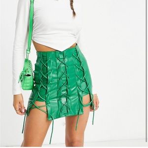 The Couture Club lace up leather look mini skirt in green
